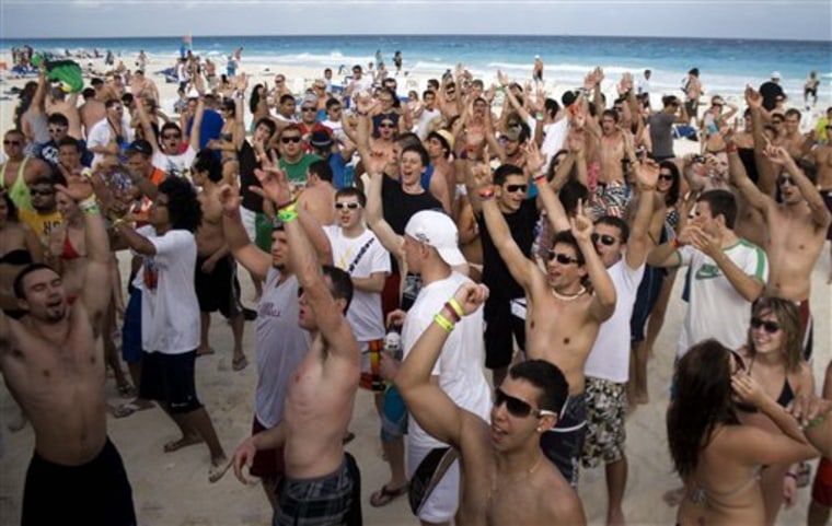 Students on spring break cheer at the beach in the resort city of Cancun, Mexico, March 1.